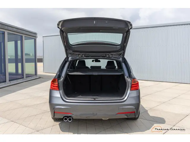 BMW 3 Serie Touring 330d High Executive 2012 Diesel 11