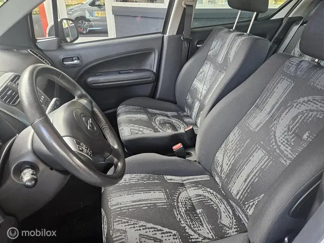 Opel Agila 1.2 Edition 2013 Benzine 9