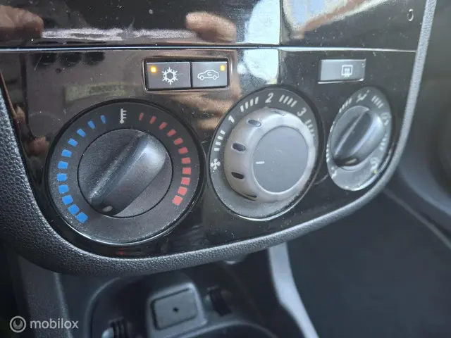 Opel Corsa 1.2 EcoFlex Cosmo 2014 Benzine 15