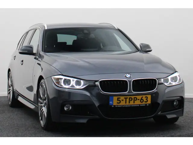 BMW 3 Serie Touring 335i High Executive 2014 Benzine 24