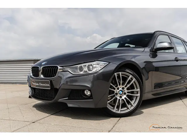 BMW 3 Serie Touring 330d High Executive 2012 Diesel 14