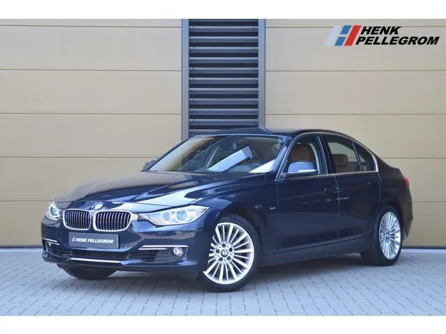 BMW 3 Serie 335i High Executive 2014 Benzine