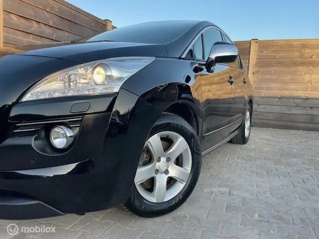 Peugeot 3008 2.0 HDiF HYbrid4 2013 Hybride Diesel 13