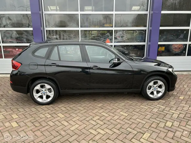 BMW X1 sDrive18i * AUTOMAAT * NAVIGATIE * AIRCO * 2013 Benzine 5