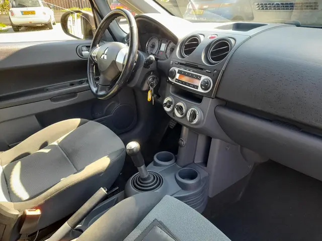 Mitsubishi Colt 1.1 Edition One 2013 Benzine 10