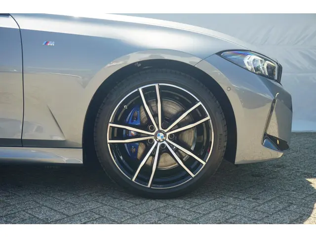 BMW 3 Serie Touring 320i 2024 Benzine 6