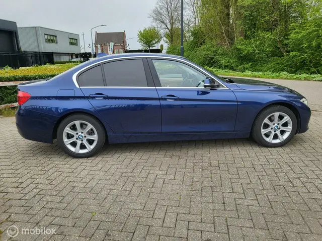BMW 3 Serie 320i High Executive 2017 Benzine 13