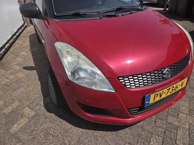 Suzuki Swift 1.2 Base 2012 Benzine 23