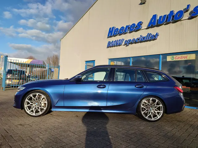 BMW 3 Serie Touring 330i High Executive 2019 Benzine 4