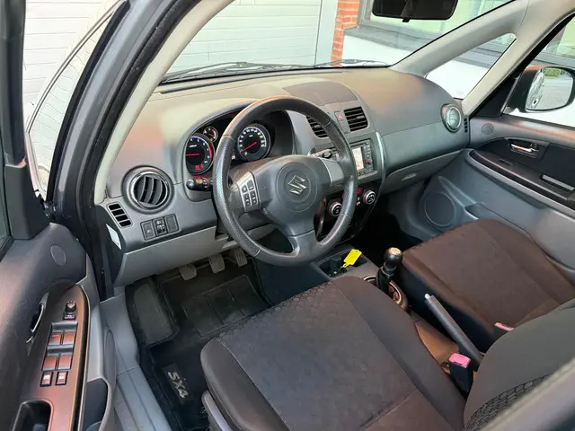Suzuki SX4 1.6 Executive| NAVI | AIRCO | NEW APK | 2012 Benzine 9