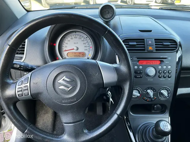 Suzuki Splash 1.0 VVT Comfort EASSS/Airco 2015 Benzine 13