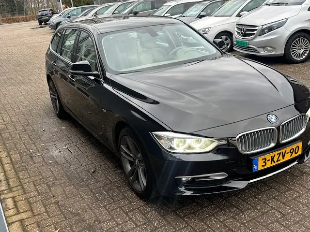 BMW 3 Serie Touring 316i High Executive 2014 Benzine 26