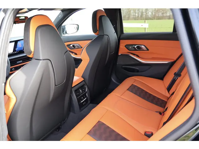 BMW M3 3-serie Touring xDrive Competition 2025 Benzine 24