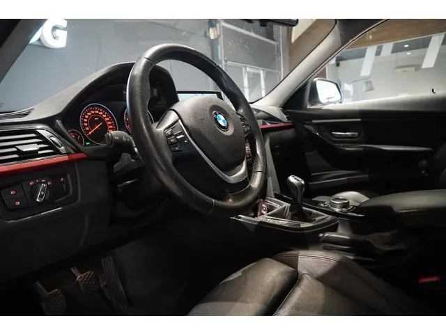 BMW 3 Serie Touring 316i High Executive 2014 Benzine 4